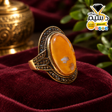 انگشتر استیل رنگ ثابت زنانه با عقیق عسلی و هاله سفید دُرسیم